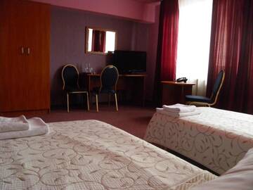 Фото номера Двухместный номер с 2 отдельными кроватями Отель Hotel Horyzont г. Жешув 12