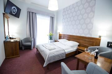 Фото номера Стандартный двухместный номер с 1 кроватью Отель Villa Riviera г. Жешув 2
