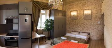 Фото номера Улучшенные апартаменты с 2 спальнями: 14 Jana III Sobieskiego St. Апартаменты The Center Apartments г. Жешув 7