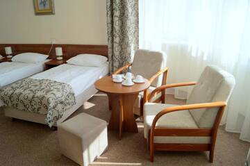 Фото номера Четырехместный номер Отель Hotel Polonia г. Жешув 4