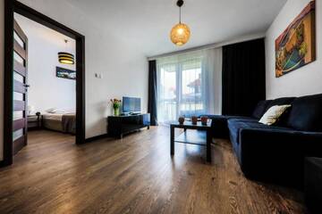Фото номера Апартаменты «Комфорт» с балконом Апартаменты EmiHouse Apartamenty г. Жешув 4