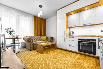 Фото номера Апартаменты-полулюкс с балконом Апартаменты EmiHouse Apartamenty г. Жешув 3