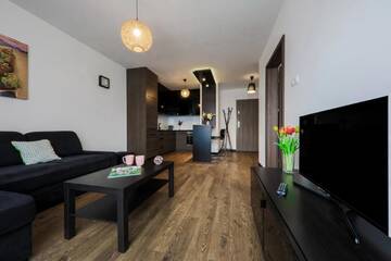 Фото номера Апартаменты «Комфорт» с балконом Апартаменты EmiHouse Apartamenty г. Жешув 3