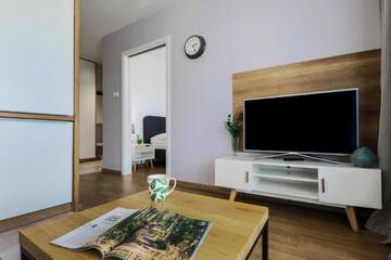 Фото номера Апартаменты-полулюкс с балконом Апартаменты EmiHouse Apartamenty г. Жешув 9