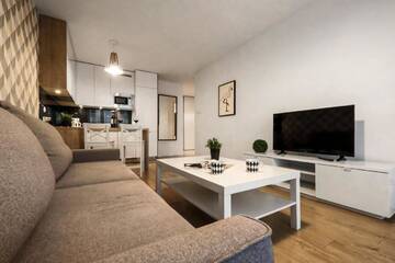 Фото номера Улучшенные апартаменты с кондиционером Апартаменты EmiHouse Apartamenty г. Жешув 4