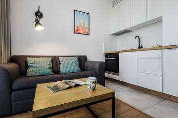 Фото номера Апартаменты-полулюкс с балконом Апартаменты EmiHouse Apartamenty г. Жешув 11