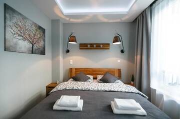 Фото номера Апартаменты с балконом Апартаменты Apartamenty eM-klimatyzacja&amp;parking г. Жешув 35