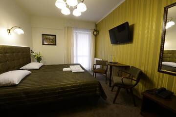 Фото номера Двухместный номер с 2 отдельными кроватями Отель Hotel Fryderyk г. Жешув 13