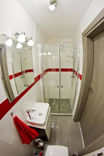 Фото номера Одноместный номер с душем Апартаменты Park Apartament г. Жешув 4