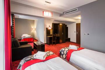Фото номера Четырехместный номер Отель Hotel Zimowit г. Жешув 2