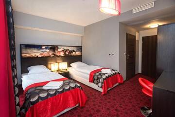Фото номера Двухместный номер с 2 отдельными кроватями Отель Hotel Zimowit г. Жешув 3